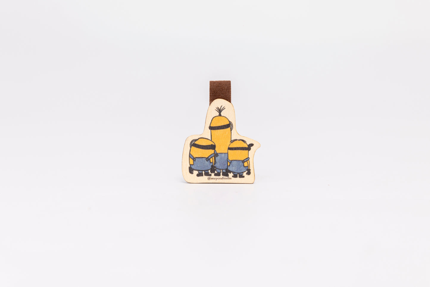 "Cute Minion wooden magnet bookmark"
"Handcrafted wooden Minion bookmark with magnet clasp"
"Eco-friendly wooden Minion bookmark for cartoon fans"
"Wooden Minion magnetic bookmark on an open book"
"Handmade Minion bookmark with light magnet for secure fit"
"Minion magnetic bookmark for books, planners, and journals"
"Unique Minion gift for readers and animated movie enthusiasts"