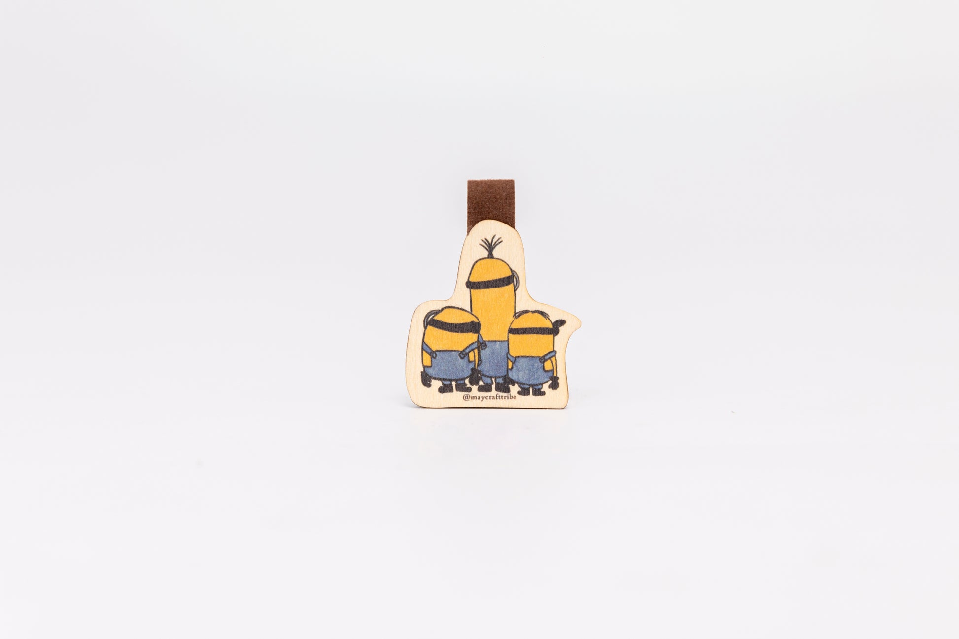 "Cute Minion wooden magnet bookmark"
"Handcrafted wooden Minion bookmark with magnet clasp"
"Eco-friendly wooden Minion bookmark for cartoon fans"
"Wooden Minion magnetic bookmark on an open book"
"Handmade Minion bookmark with light magnet for secure fit"
"Minion magnetic bookmark for books, planners, and journals"
"Unique Minion gift for readers and animated movie enthusiasts"