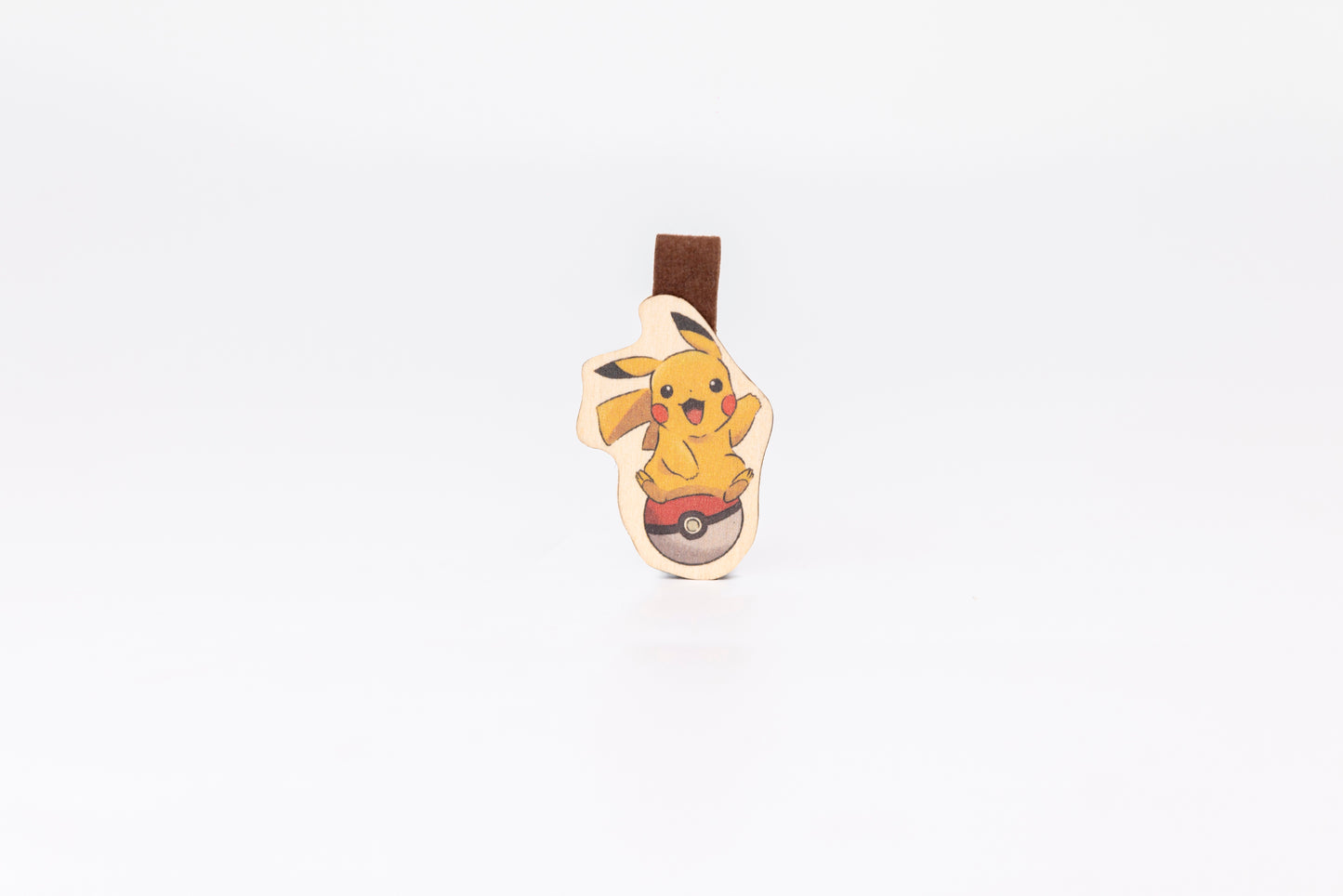 "Cute Pikachu wooden magnet bookmark"
"Handcrafted wooden Pikachu bookmark with magnet clasp"
"Eco-friendly wooden Pikachu bookmark for Pokémon fans"
"Wooden Pikachu magnetic bookmark on an open book"
"Handmade Pikachu bookmark with light magnet for secure fit"
"Pikachu magnetic bookmark for books, planners, and journals"
"Unique Pikachu gift for readers and Pokémon enthusiasts"