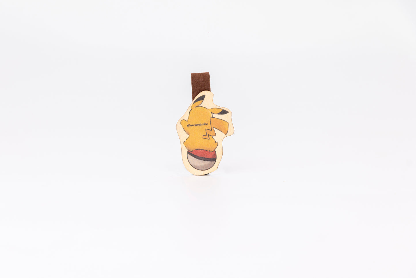 "Cute Pikachu wooden magnet bookmark"
"Handcrafted wooden Pikachu bookmark with magnet clasp"
"Eco-friendly wooden Pikachu bookmark for Pokémon fans"
"Wooden Pikachu magnetic bookmark on an open book"
"Handmade Pikachu bookmark with light magnet for secure fit"
"Pikachu magnetic bookmark for books, planners, and journals"
"Unique Pikachu gift for readers and Pokémon enthusiasts"