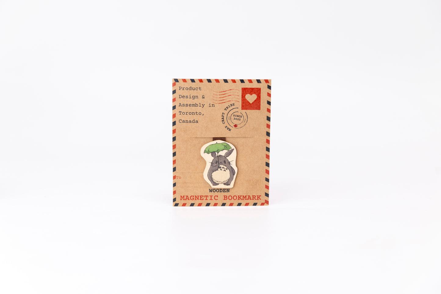 "Cute Totoro wooden magnet bookmark"
"Handcrafted wooden Totoro bookmark with magnet clasp"
"Eco-friendly wooden Totoro bookmark for Studio Ghibli fans"
"Wooden Totoro magnetic bookmark on an open book"
"Handmade Totoro bookmark with light magnet for secure fit"
"Totoro magnetic bookmark for books, planners, and journals"
"Unique Totoro gift for readers and Ghibli enthusiasts"