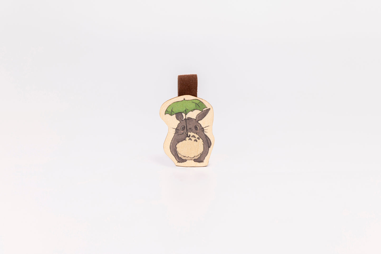 "Cute Totoro wooden magnet bookmark"
"Handcrafted wooden Totoro bookmark with magnet clasp"
"Eco-friendly wooden Totoro bookmark for Studio Ghibli fans"
"Wooden Totoro magnetic bookmark on an open book"
"Handmade Totoro bookmark with light magnet for secure fit"
"Totoro magnetic bookmark for books, planners, and journals"
"Unique Totoro gift for readers and Ghibli enthusiasts"