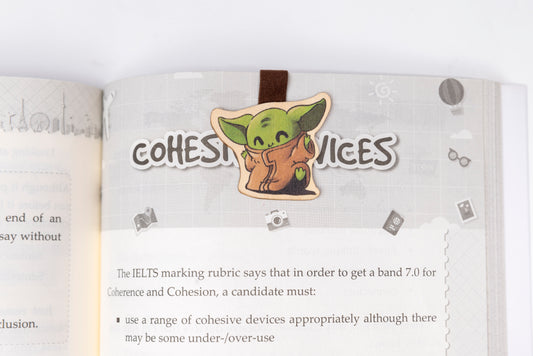 "Cute Baby Yoda wooden magnet bookmark"
"Handcrafted wooden Baby Yoda bookmark with magnet clasp"
"Eco-friendly wooden Baby Yoda bookmark for Star Wars fans"
"Wooden Baby Yoda magnetic bookmark on an open book"
"Handmade Baby Yoda bookmark with light magnet for secure fit"
"Baby Yoda magnetic bookmark for books, planners, and journals"
"Unique Baby Yoda gift for readers and Star Wars enthusiasts"