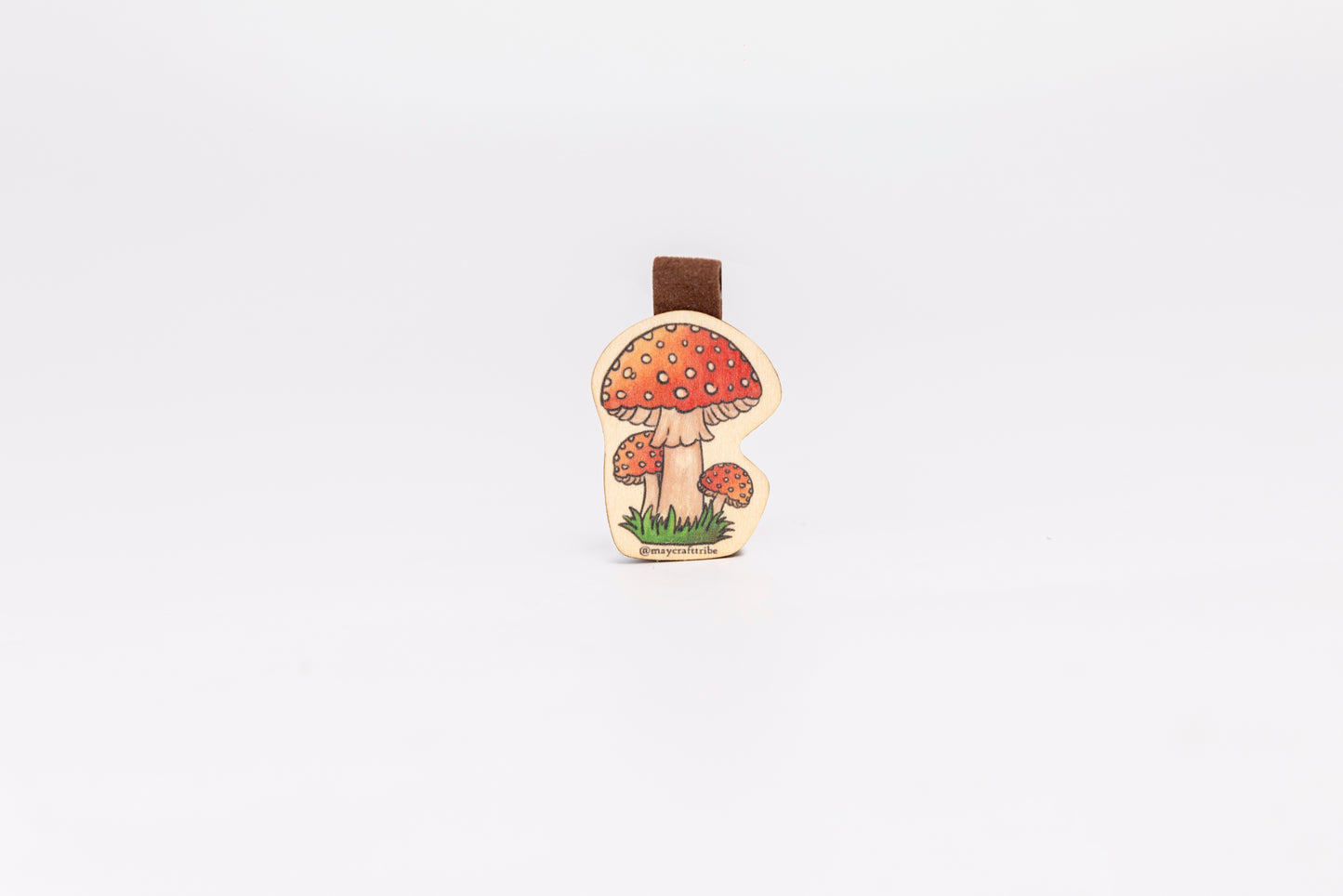 "Charming Mushroom wooden magnet bookmark"
"Handcrafted wooden Mushroom bookmark with magnet clasp"
"Eco-friendly wooden Mushroom bookmark for nature lovers"
"Wooden Mushroom magnetic bookmark on an open book"
"Handmade Mushroom bookmark with light magnet for secure fit"
"Mushroom magnetic bookmark for books, planners, and journals"
"Unique Mushroom gift for readers and woodland enthusiasts"
