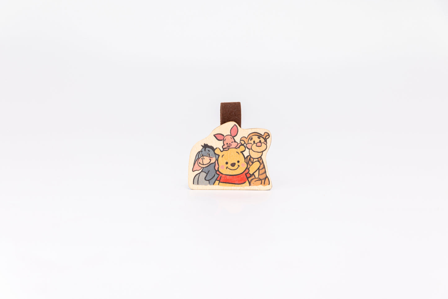 Cute Pooh Bear wooden magnet bookmark"
"Handcrafted wooden Pooh Bear bookmark with magnet clasp"
"Eco-friendly wooden Pooh Bear bookmark for classic story fans"
"Wooden Pooh Bear magnetic bookmark on an open book"
"Handmade Pooh Bear bookmark with light magnet for secure fit"
"Pooh Bear magnetic bookmark for books, planners, and journals"
"Unique Pooh Bear gift for readers and children’s book enthusiasts